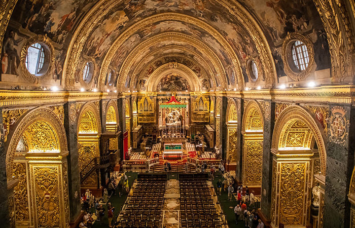 visit the cathedral of San Giovanni in Valetta