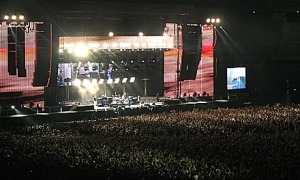 Police performing live on stage to thousands of fans