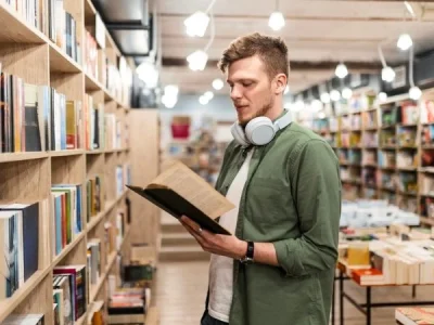 boy in college library