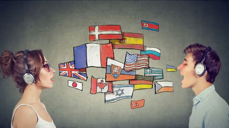 two people speaking with flags between them to represent language certifications