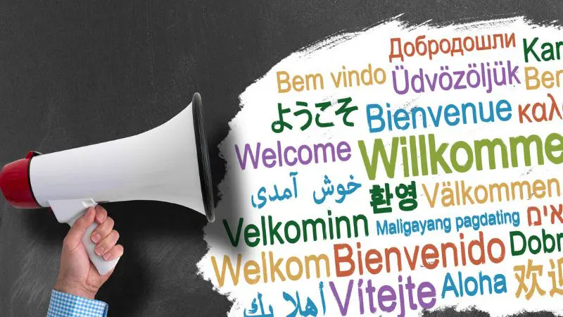 megaphone with the word hello in multiple languages to represent the most spoken languages in the world
